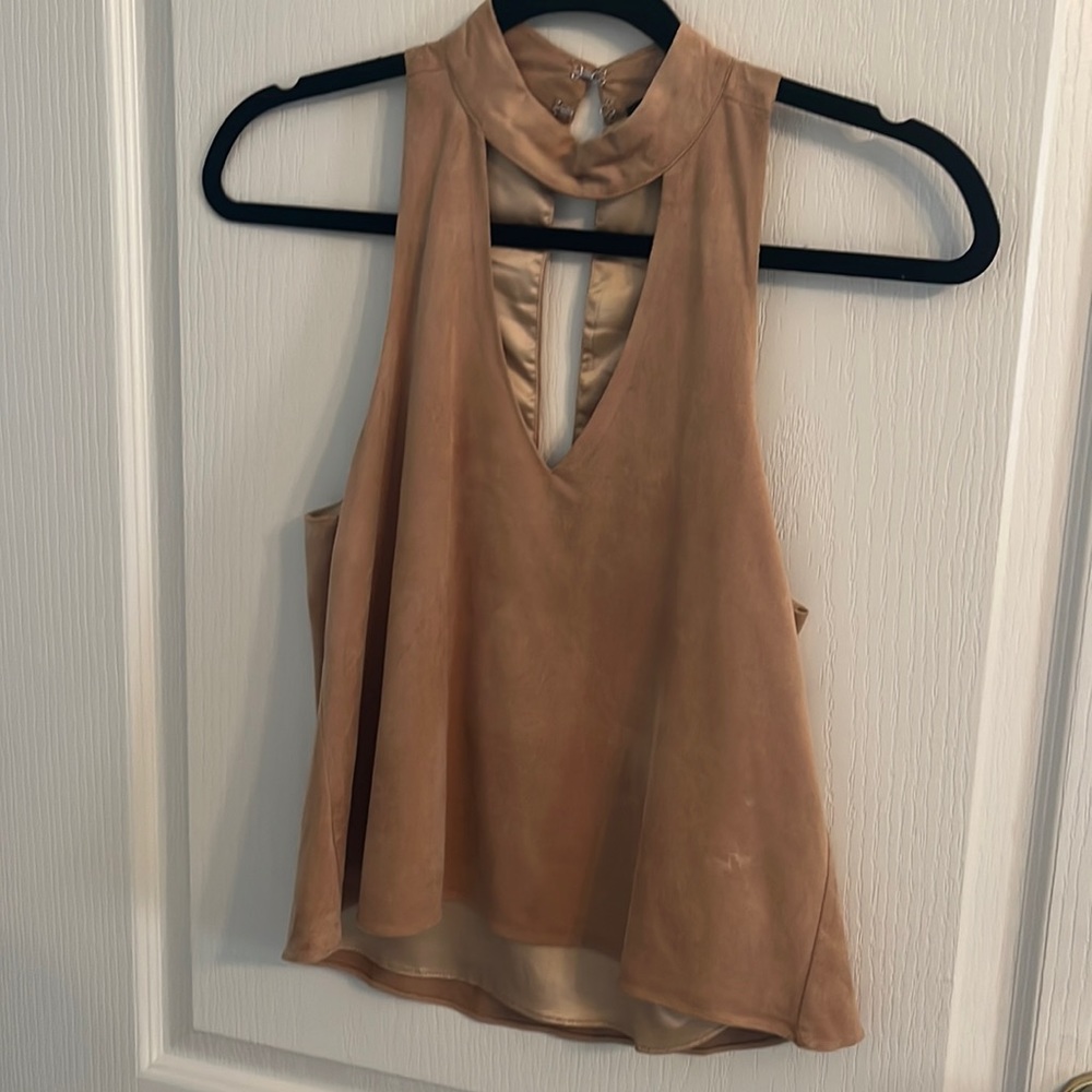 Tan suede top.